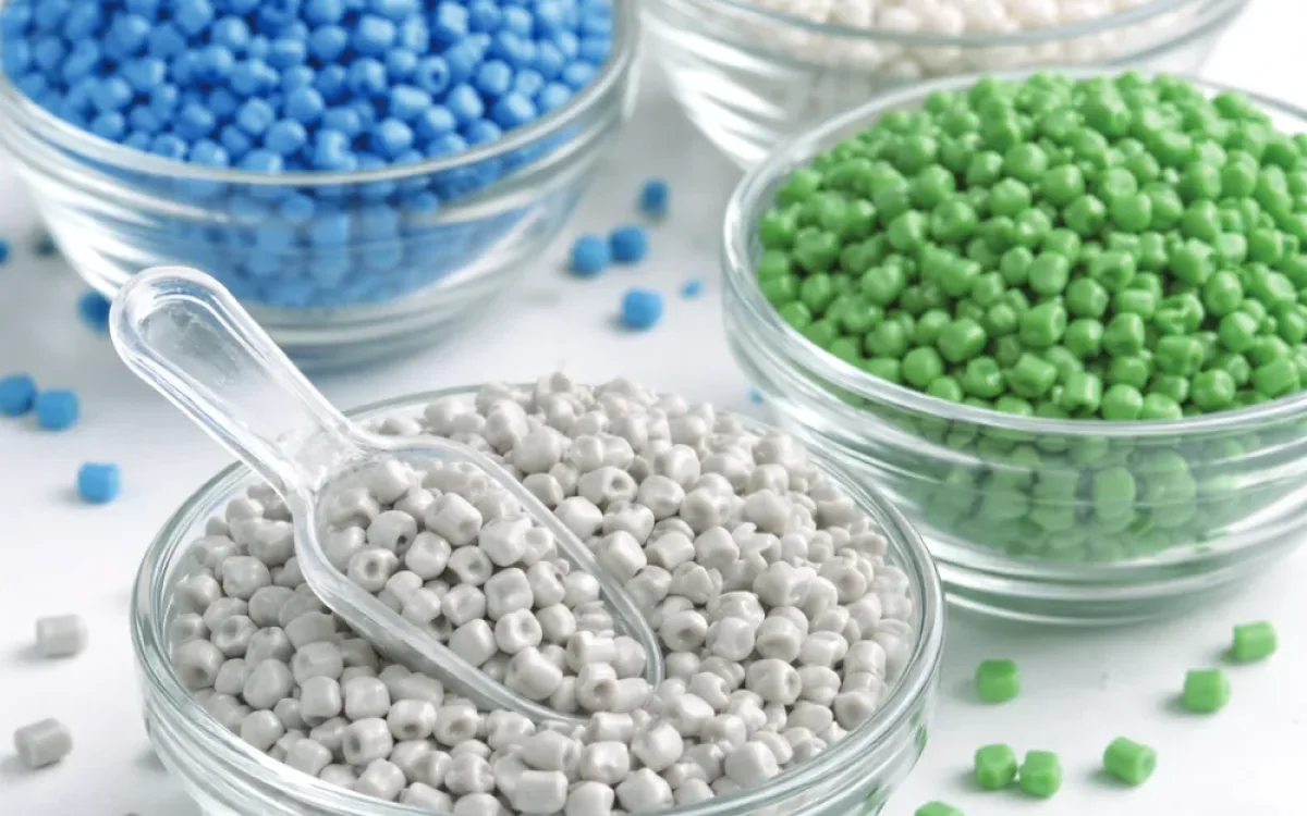 Coloured polypropylene granules in glass bowls